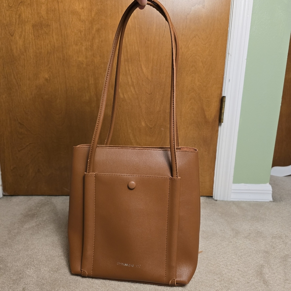 Madison Ave Medium Tote by the brand Expressions NYC. This is a popular...